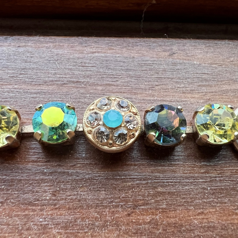 Gold Marianna bracelet missing two crystals